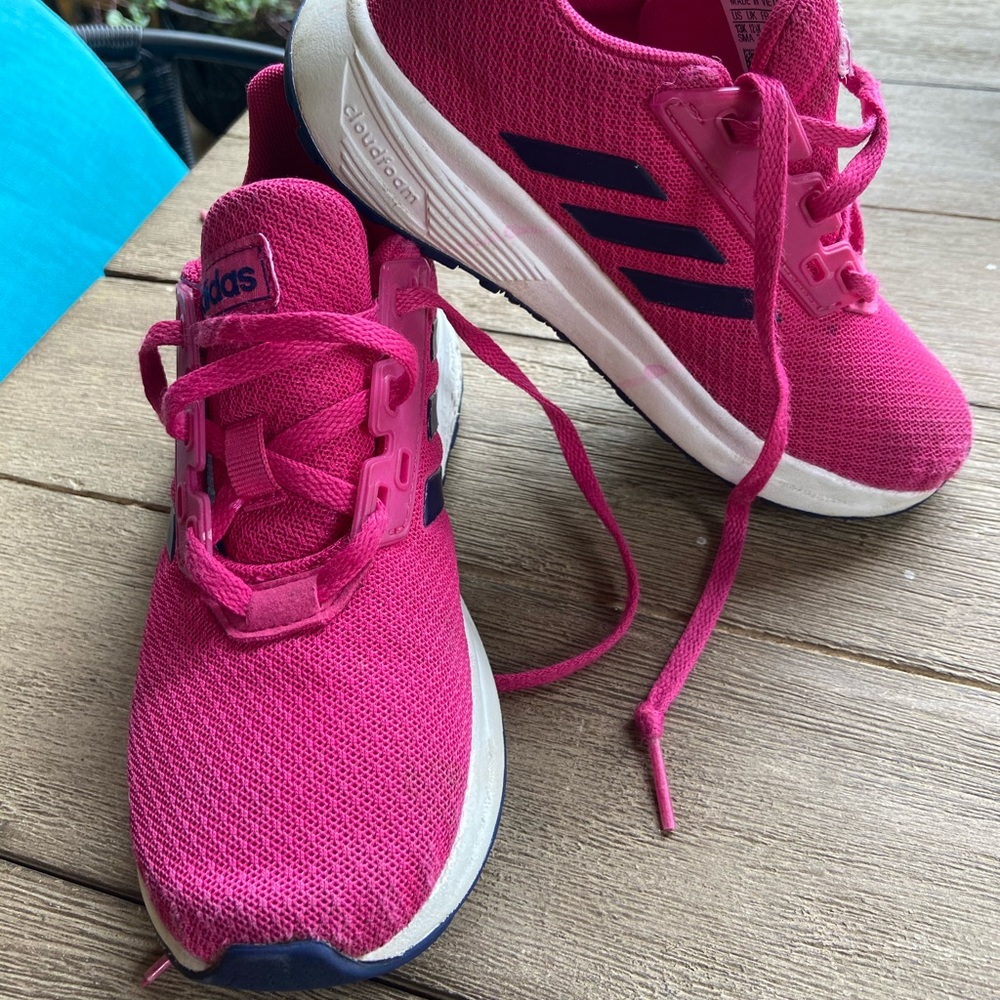 Hot pink and navy tennis shoes in good condition